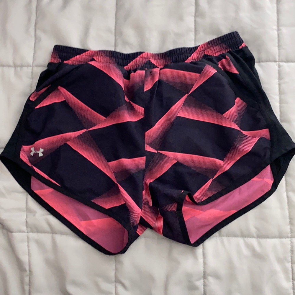 pink and black under armor athletic shorts